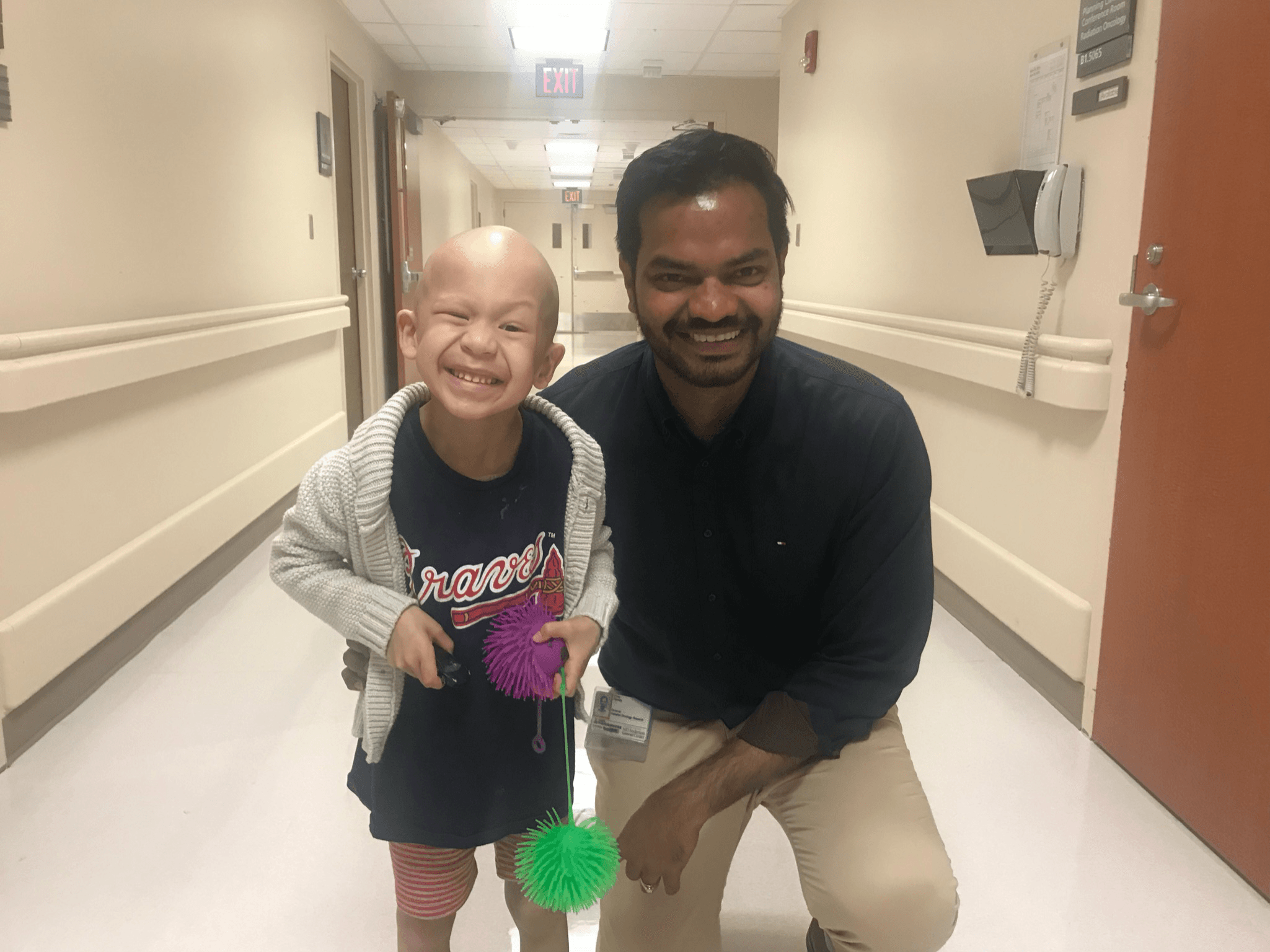 Dr. Vijay Karan Reddy with a young patient
